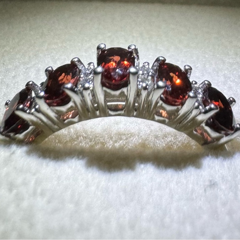 5 Garnet stones with diamonds. Platinum setting & band. Brand new never worn